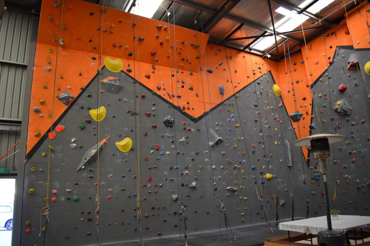 When walking into the gym, this is the climbing wall directly to the left. There's a steep incline at the top of the first 5 ropes, making the finnishes of the climbs slightly more challenging.
